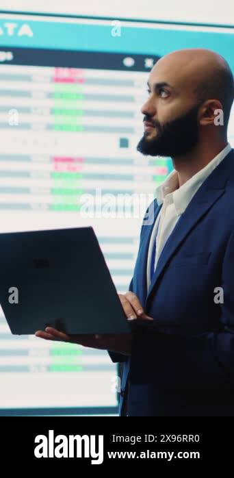 Vertical Video Business investor reviewing latest budgeting plans on a