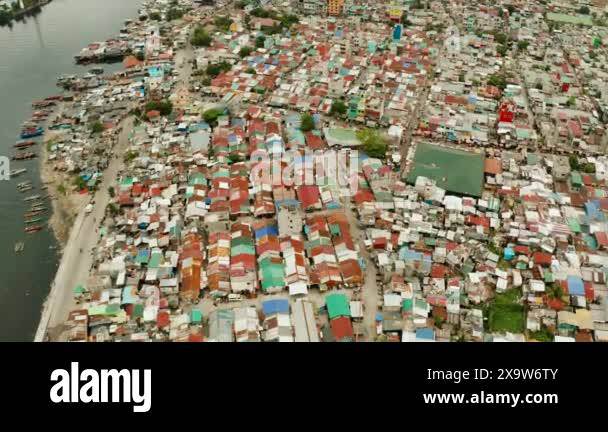 Poor district and slums in Manila with shacks and buildings. Manila ...