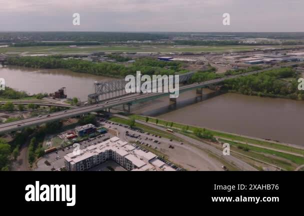 Capture the vibrant urban and natural landscape of kansas citys bridge ...
