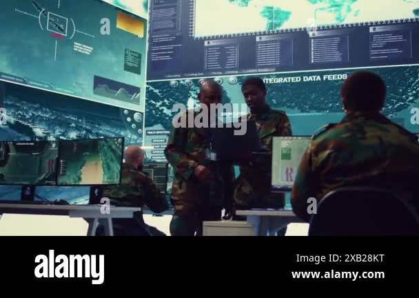 Signal support systems specialists work with battlefield data and ...