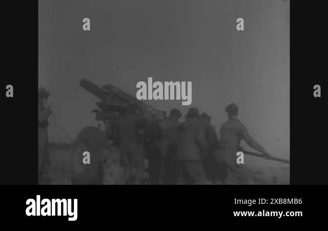 Soldier Riding Rocket 1950 - A 155mm howitzer fires, US tanks cross over a muddy field, US ...
