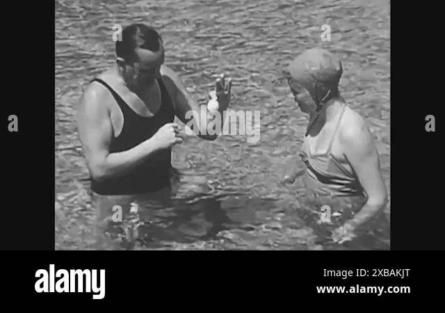 A beginning swimmer learns about her buoyancy, picking an egg up off ...
