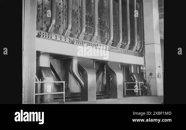 1936 - Steam-powered machines are used at a hydroelectric plant Stock ...