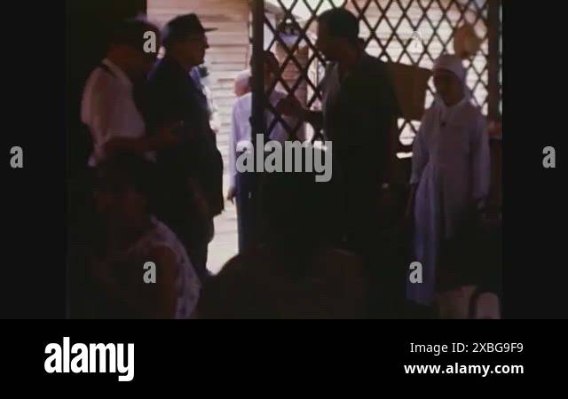 A south Vietnamese official confers with doctors and Vietnamese