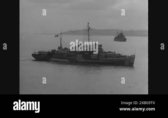 United States Navy warships are shown in a convoy during the Battle of ...