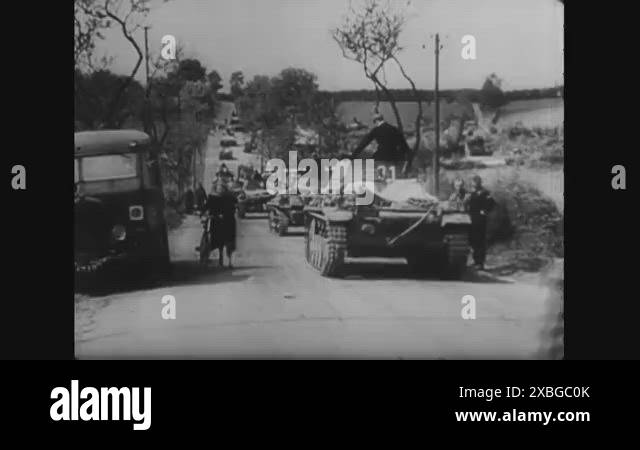 Hitler Loading 1945 - Nazi armored units move down a French countryside. Nazi soldiers ...