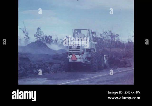 1973 - Construction plows are used to shift rocks in the aftermath of ...