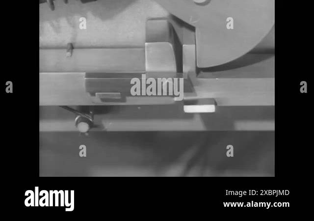 A soldier demonstrates a semi-automatic firing mechanism, in a model ...