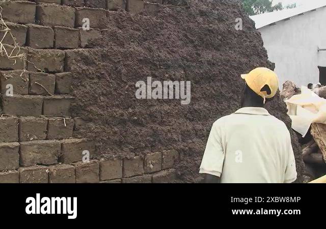 Mud wall making Stock Videos & Footage - HD and 4K Video Clips - Alamy