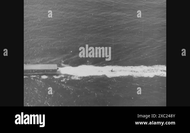 1944 - A damaged US Navy plane crash lands on the flight deck of an ...