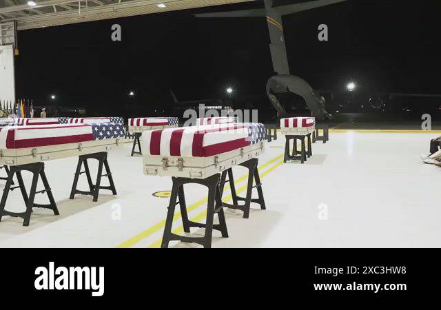 U.S. service members conducting repatriation ceremony of the remains ...