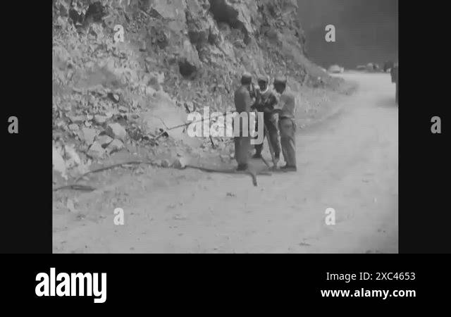 1951 - A Korean laborer helps US Army engineers drill holes in a rock ...