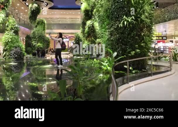 Singapore- 7 May 2024: Dreamscape garden inside Changi Airport Terminal ...