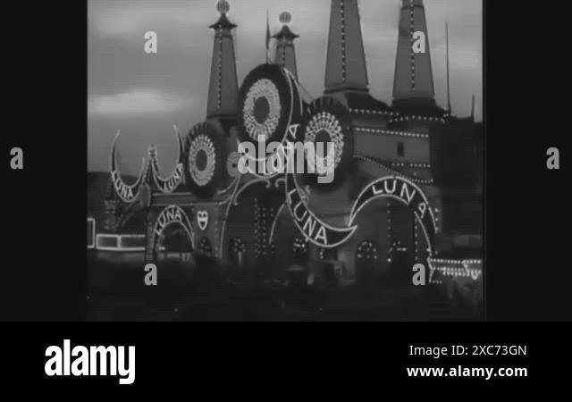 1930s - People enjoy rides at Coney Island's Luna Park at night ...