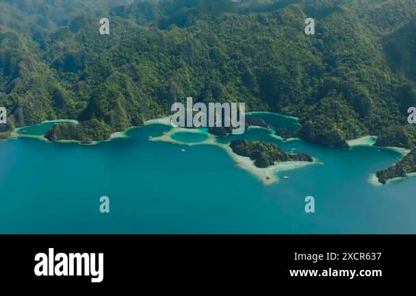 Lagoons with splendid limestone rocks. Blue sea and turquoise lagoons ...