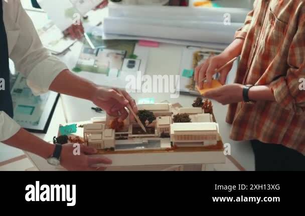 Smart architect or civil engineer writing building structure idea on ...