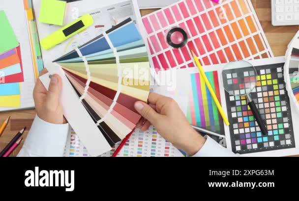 Graphic designer workspace and color palette. Choosing colors in the ...