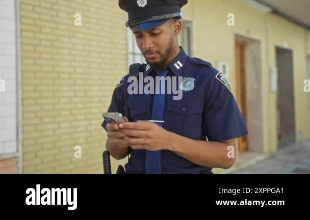 Focused black policeman in uniform Stock Videos & Footage - HD and 4K ...