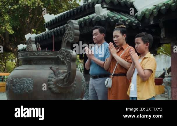 Family praying temple Stock Videos & Footage - HD and 4K Video Clips ...