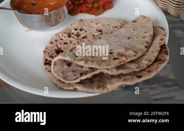 Roti and dal Stock Videos & Footage - HD and 4K Video Clips - Alamy
