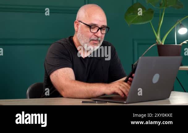 Professional male programmer brainstorming in a modern office. Perfect ...