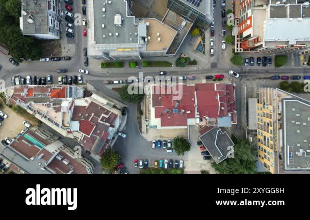 Drone video of an urban neighborhood, showcasing a top-down view of ...
