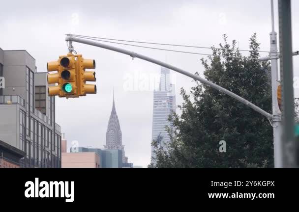 New York City street crossroad, yellow traffic light, transport road ...