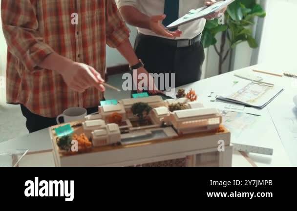 Smart architect or civil engineer writing building structure idea on ...
