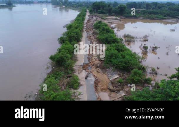 Landslides caused by heavy rains have caused the asphalt roads to crack ...