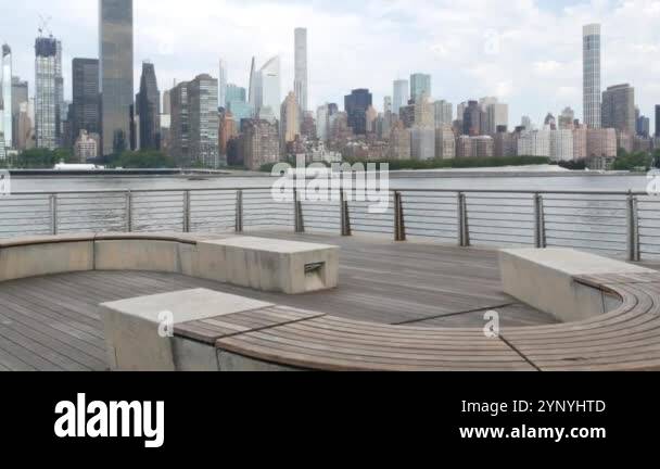 View of New York City waterfront skyline, Manhattan Midtown buildings ...
