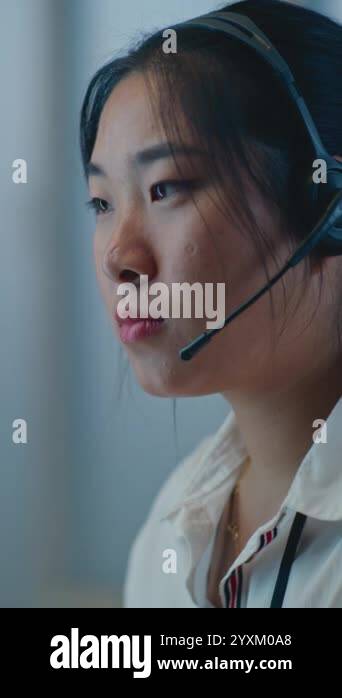 Modern call center office of psychological helpline: Vertical shot of ...
