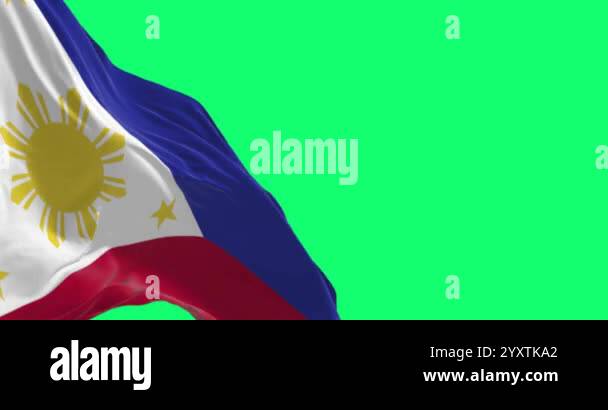 Close Up Of Philippines National Flag Waving Isolated On Green