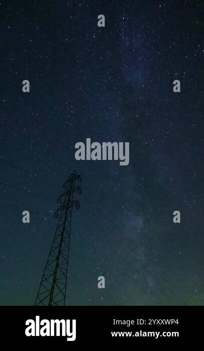 A serene night sky filled with countless stars and faint hints of the ...