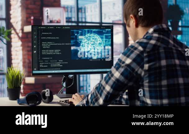 Developer writing code on computer and doing maintenance on artificial ...