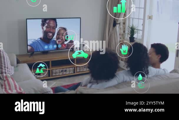 Watching TV, family with energy and environmental icons animation over ...