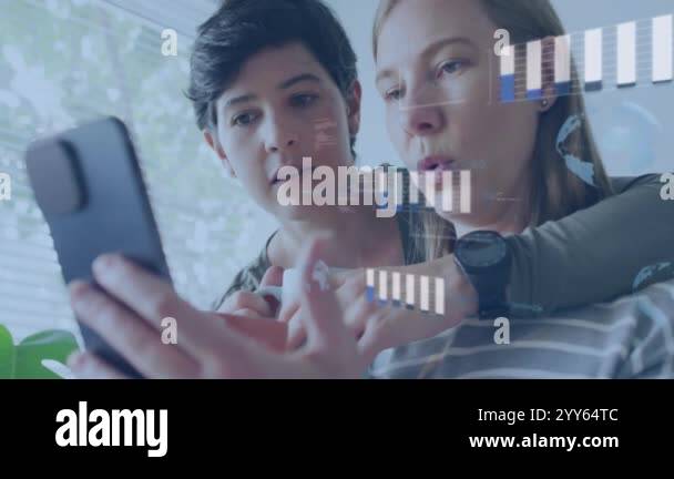 Viewing smartphone together, couple with data analytics animation over ...