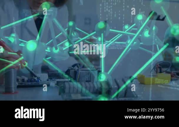 Working with electronics, scientist studying neural network animation ...