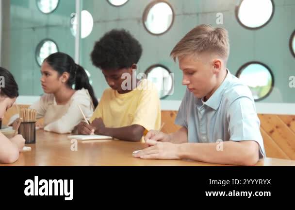 Lecturing Boy Smart boy listening teacher explain while lecturing and think about ...