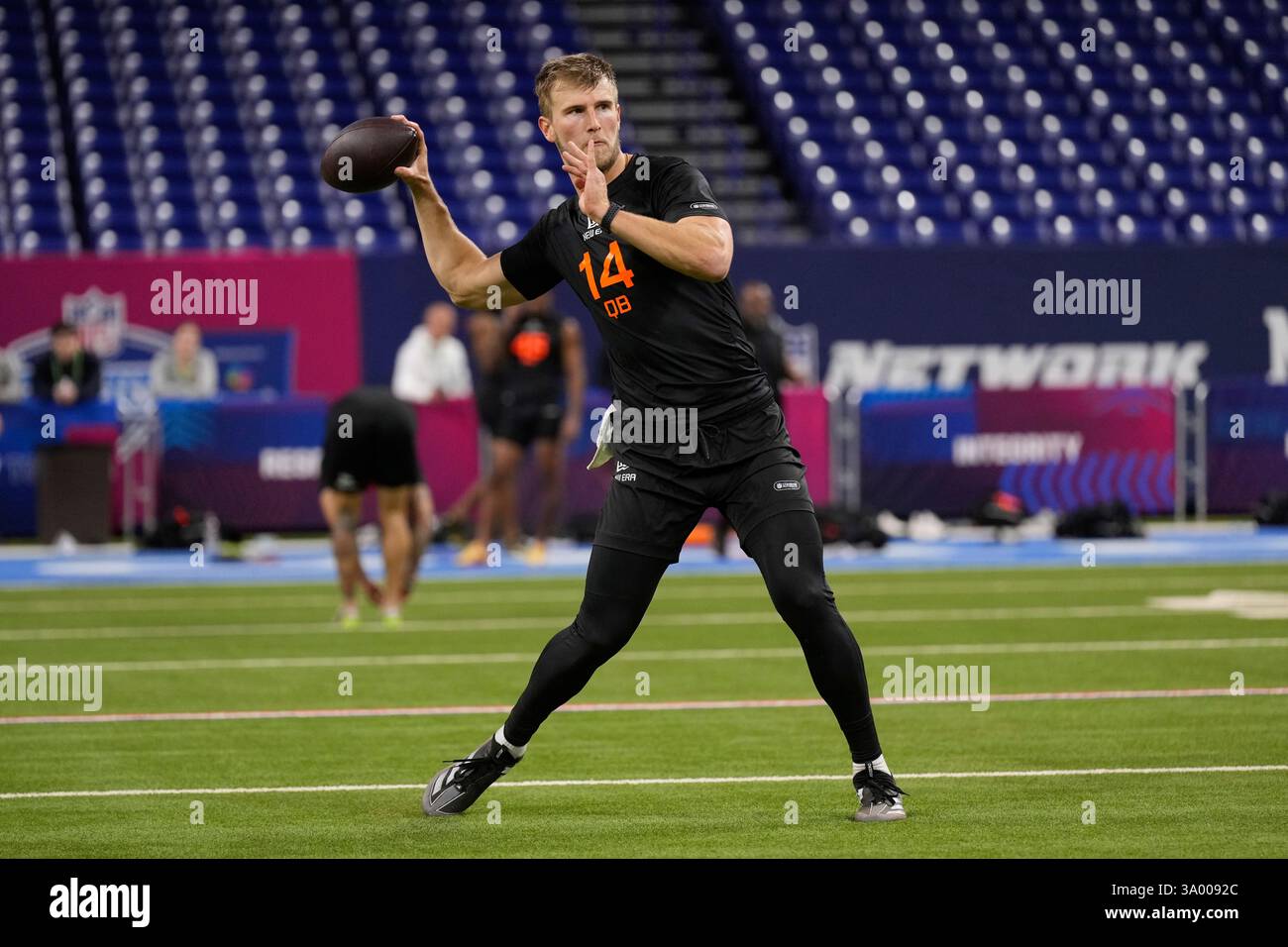 Louisville quarterback Tyler Shough runs a drill at the NFL football
