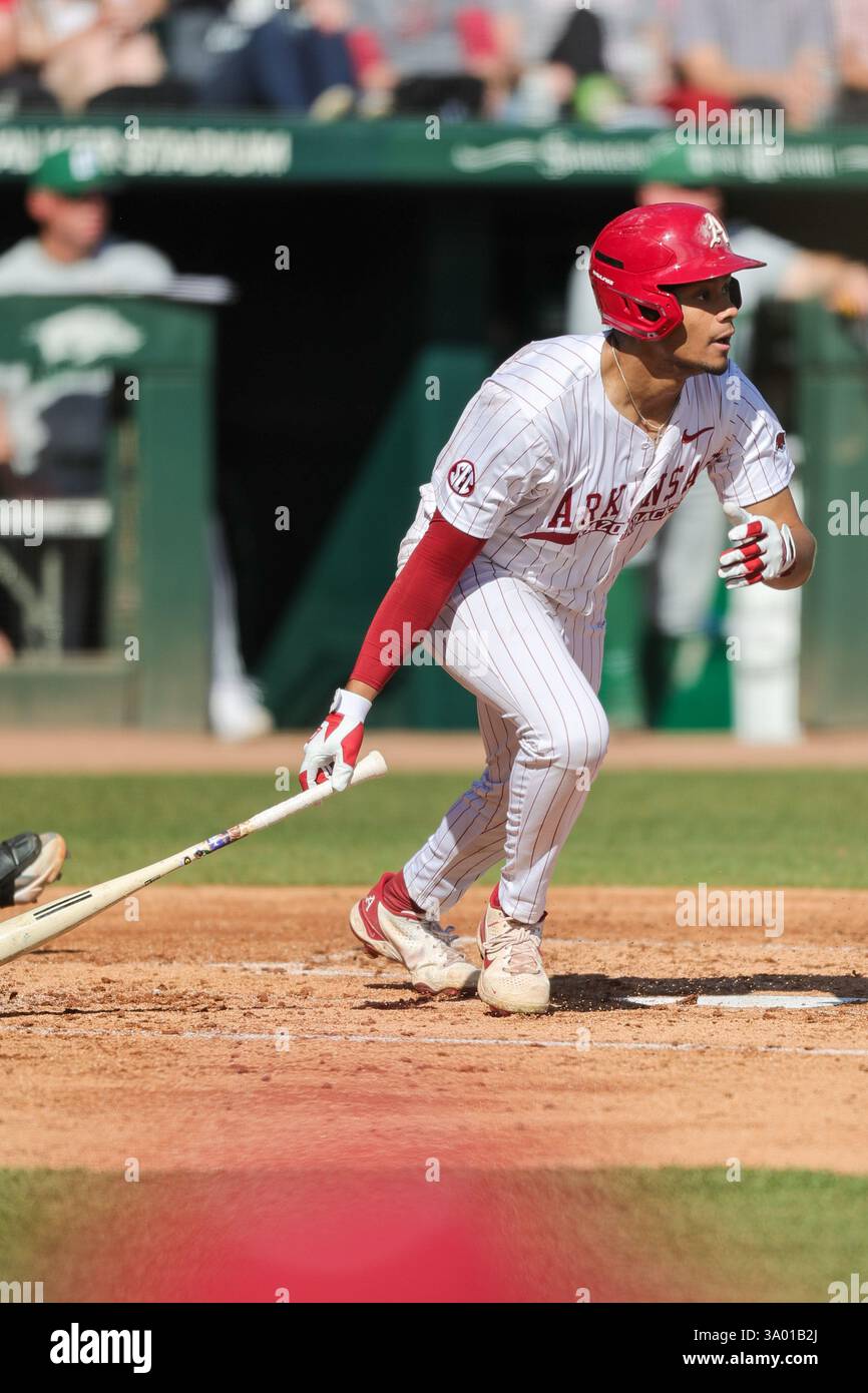 March 1, 2025: Razorback outfielder Kendall Digs (5) lays down his bat ...