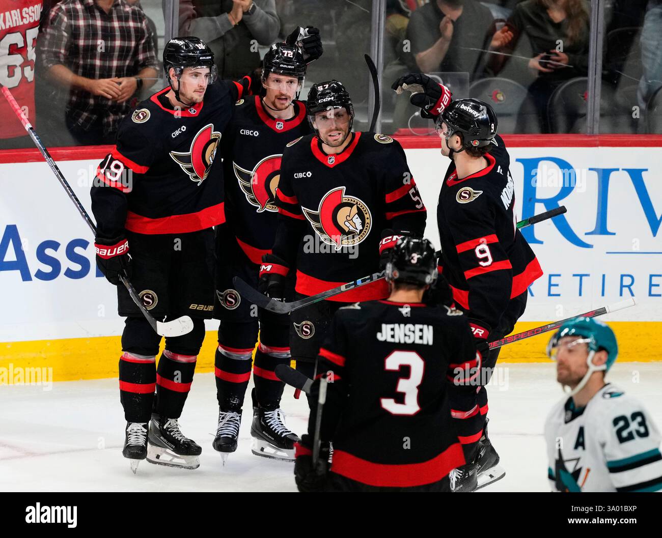 Ottawa Senators players celebrate David Perron's goal against the San ...
