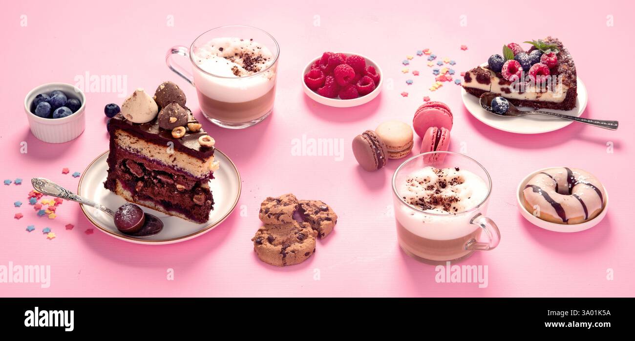 Table with cookies, donuts, cakes, cheesecakes and coffee cups  on pink background.  Delicious dessert table. Stock Photo