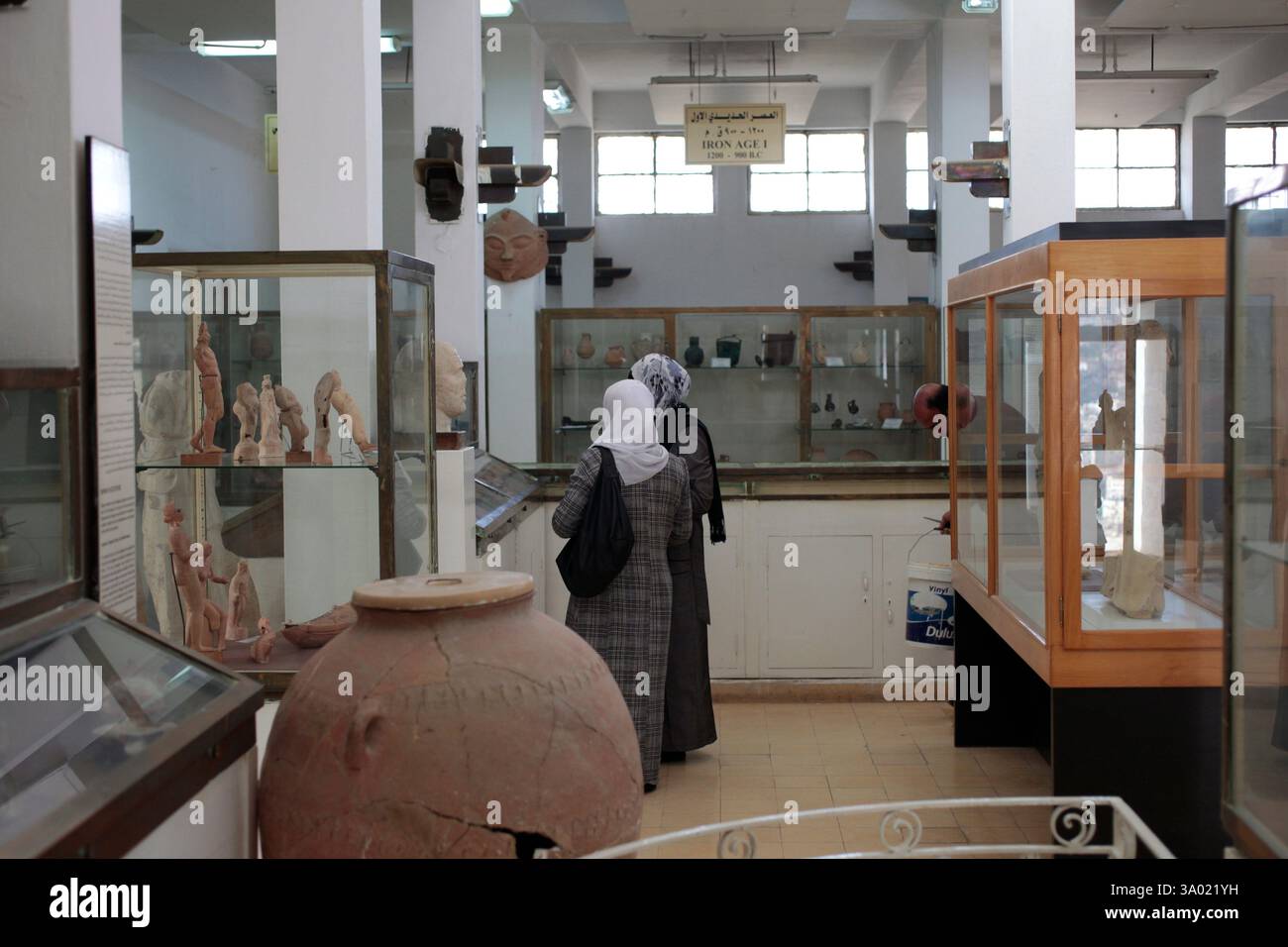 Local Visitors looking at ancient exhibits in the Archaeological Museum ...