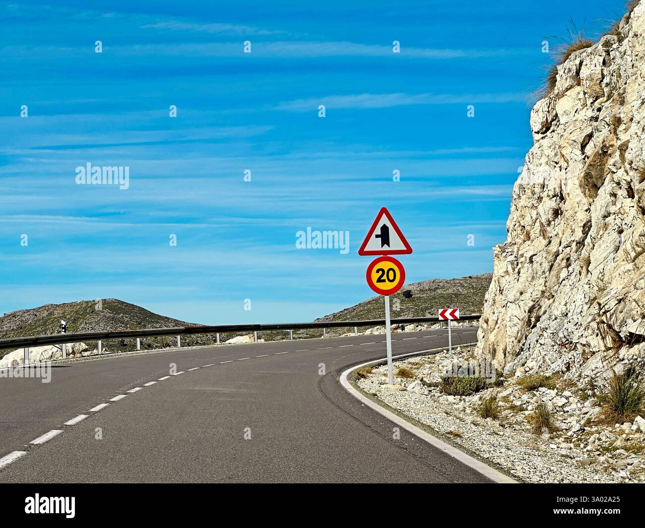 Countryside Landscape with a traffic sign Against Blue Cloudy Sky - Smartphone Captured Stock Image