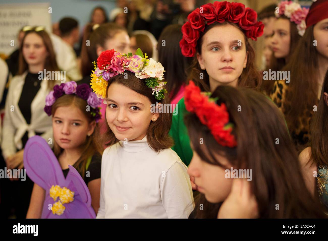 Children of Romania's ethnic minorities wait before performing in show