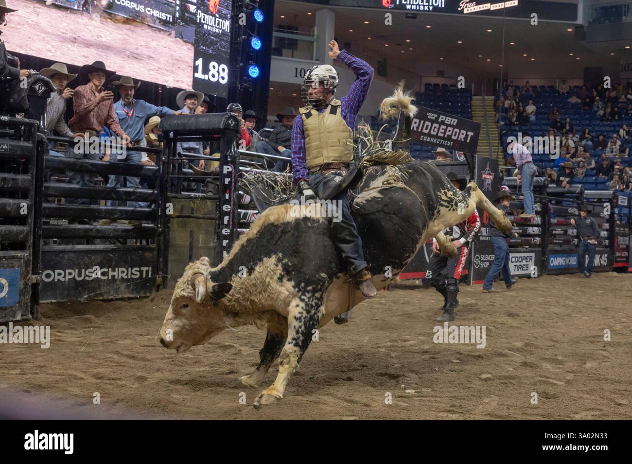 Eric Novoa rides Redneck Rumble during the Professional Bull Riders ...