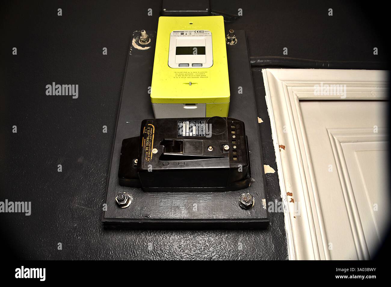 View of an electrical panel with an old circuit breaker and its new ...