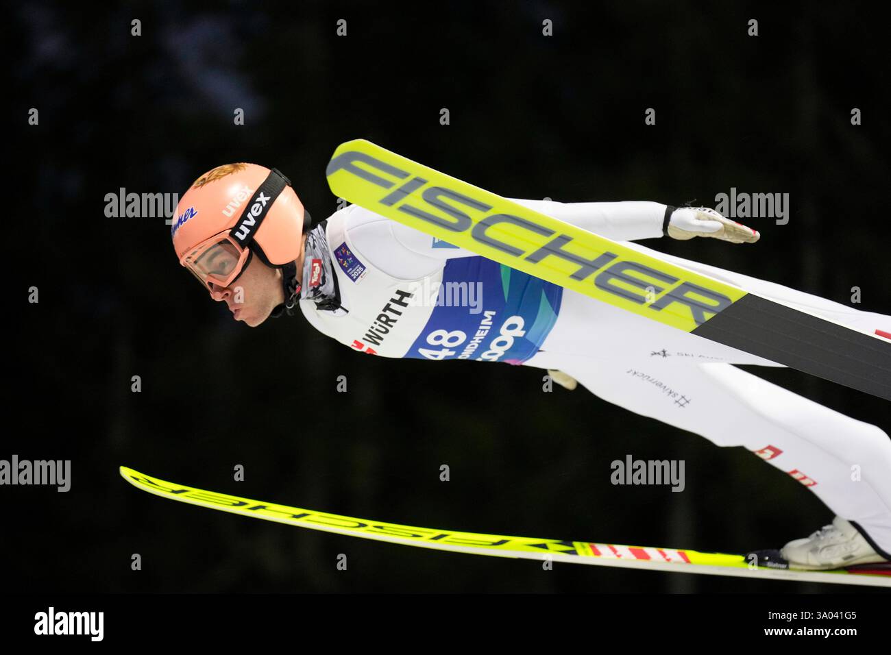 Stefan Kraft, of Austria, soars through the air during his first round ...