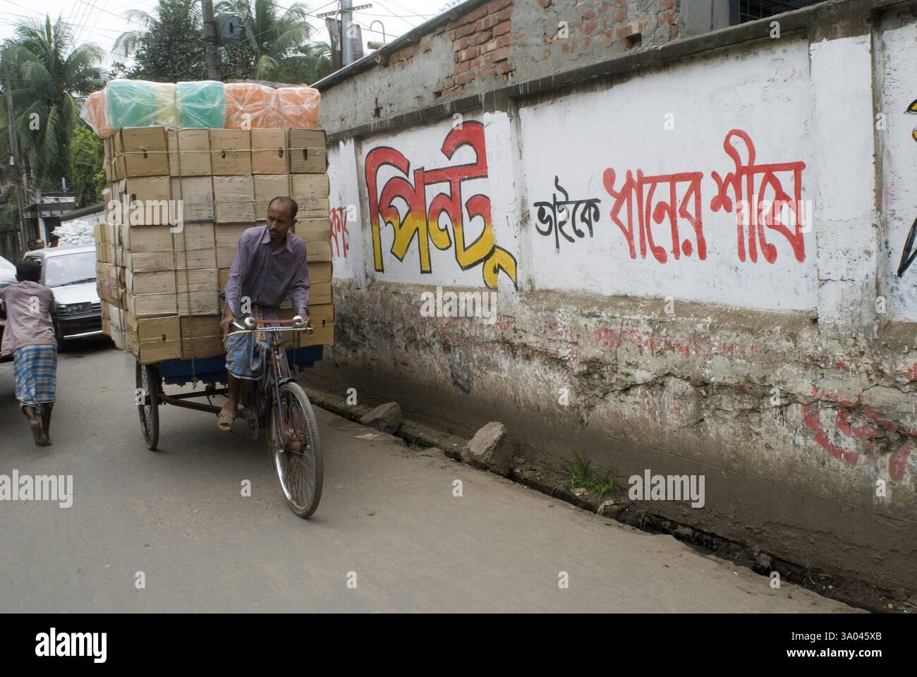 Cycle Rickshaw Rider with Heavy load on street at Dhaka, Bangladesh ...