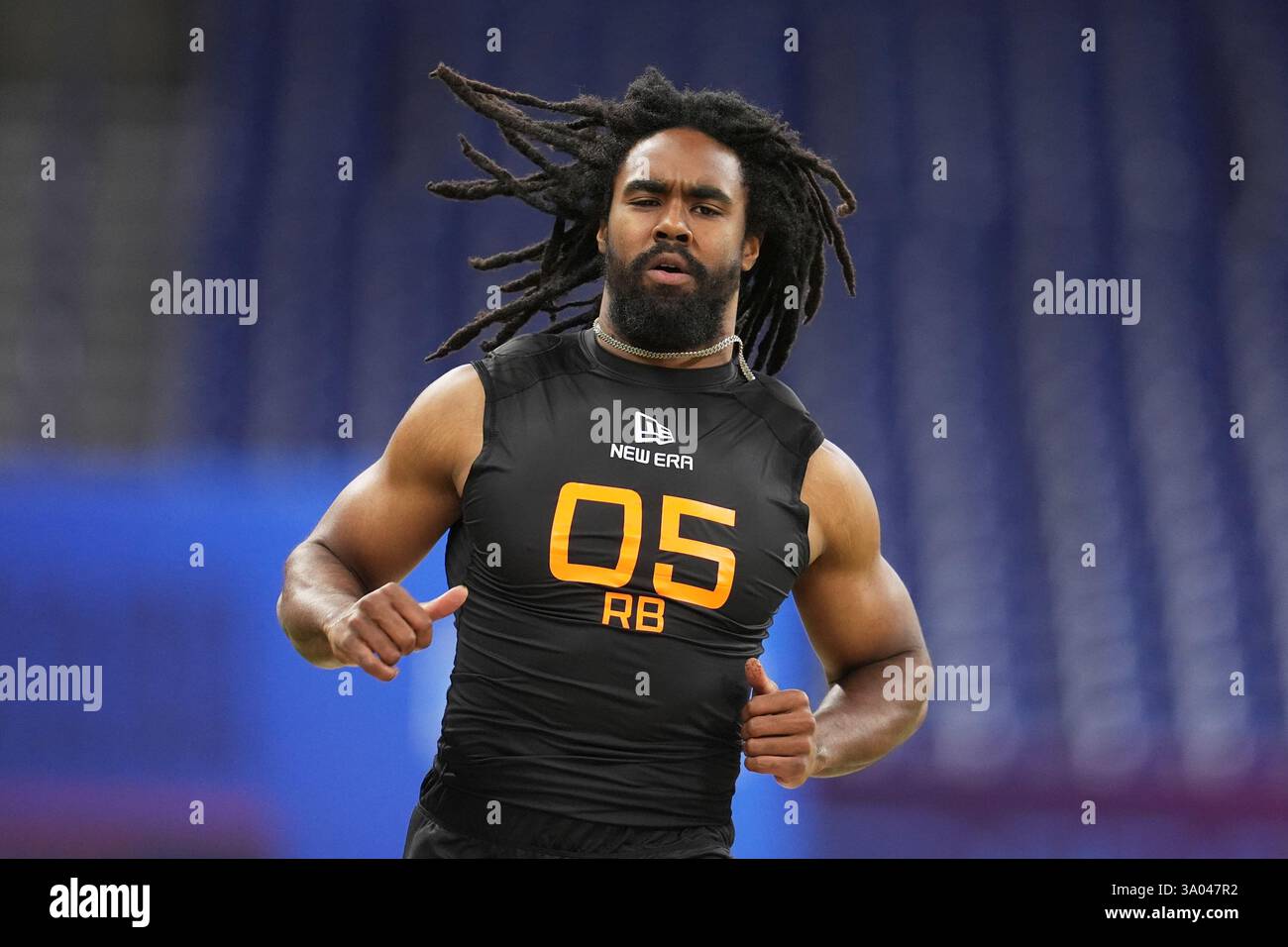 Michigan running back Donovan Edwards runs the 40-yard dash at the NFL